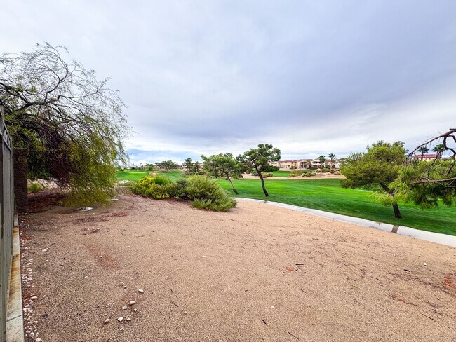 Building Photo - LUXURY LIVING • GOLF COURSE VIEW • GUARD-GATED COMMUNITY