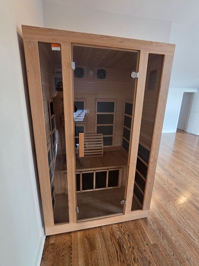 Building Photo - STUNNING 4-LEVEL TOWNHOME IN HIGHLANDS WITH SAUNA, 2-CAR GARAGE + AMAZING ROOFTOP DECK!