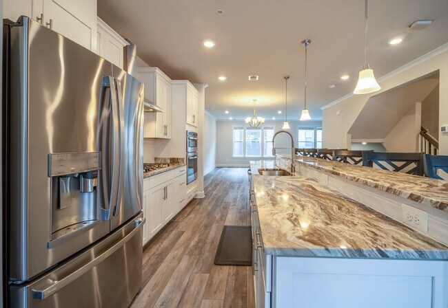 Building Photo - Modern Kincora Townhome-Style Condo | 3 Bedrooms | EV Charging | Backing to 165 Acres of Conserva...