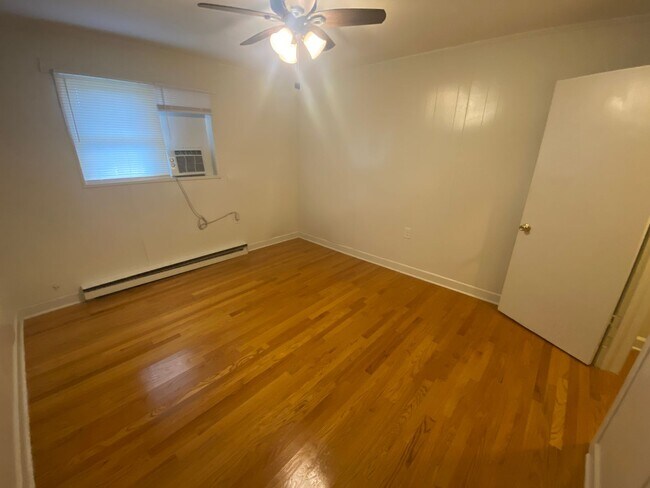 Building Photo - Private carport, in-unit laundry, and the Lakewood strip right outside your door.