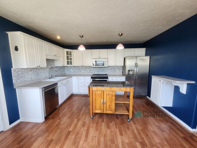 Building Photo - Spacious 4-Bedroom Home in Spokane Valley with Finished Basement & Fenced Yard