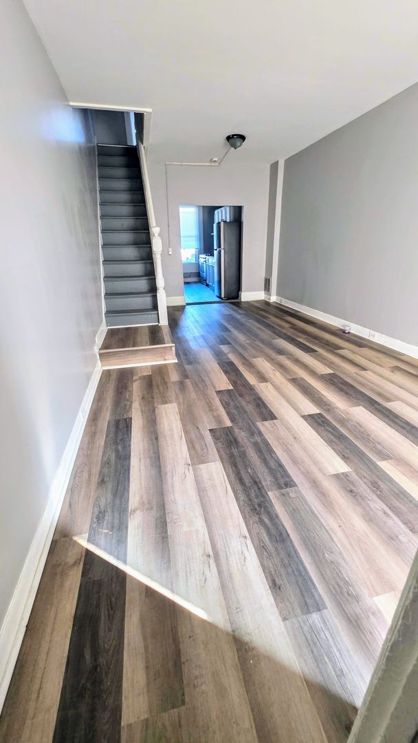 Building Photo - Beautiful Two Bedroom, Plus a Pass Through Room with a Fenced in Rear Patio