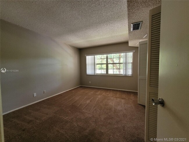 Building Photo - 4261 W Palm Aire Dr