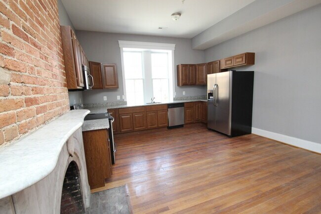 Building Photo - 211 W Lanvale St