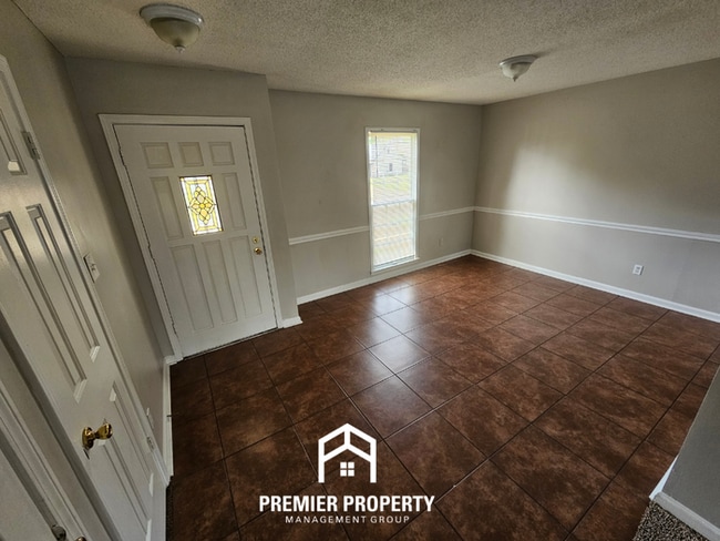 Building Photo - Quiet Cove Living in 38115 | 3BR/2BA with Brick Fireplace & Fenced Yard