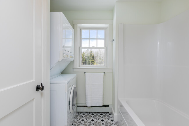 the private shower and laundry area of the large upstairs bathroom. - 96 Spurwink Rd