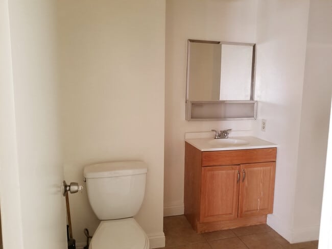 Building Photo - Triplex Unit Coming Soon