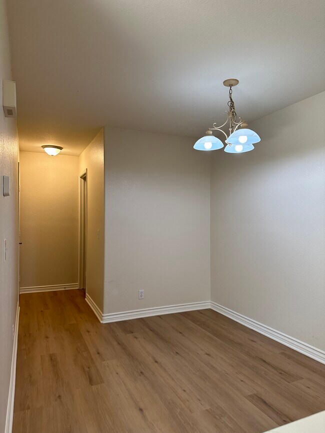 Hallway to First Floor Bathroom - 13784 Sycamore Tree Ln
