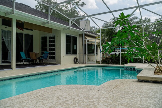 Building Photo - Beautiful 3/3 Pool Home in Gated Community W/ Lake Access