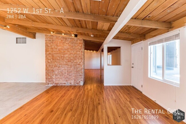 Building Photo - Spectacular 2 Bedroom W/ Exposed Beams & B...