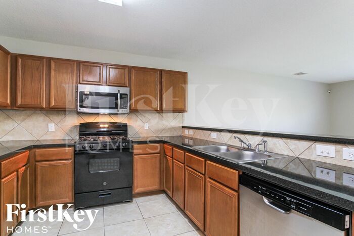 Building Photo - 9885 Hyacinth Way