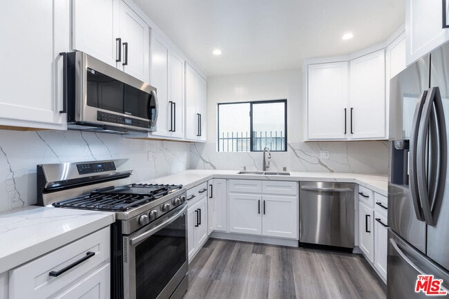 Building Photo - 1262 N Sweetzer Ave