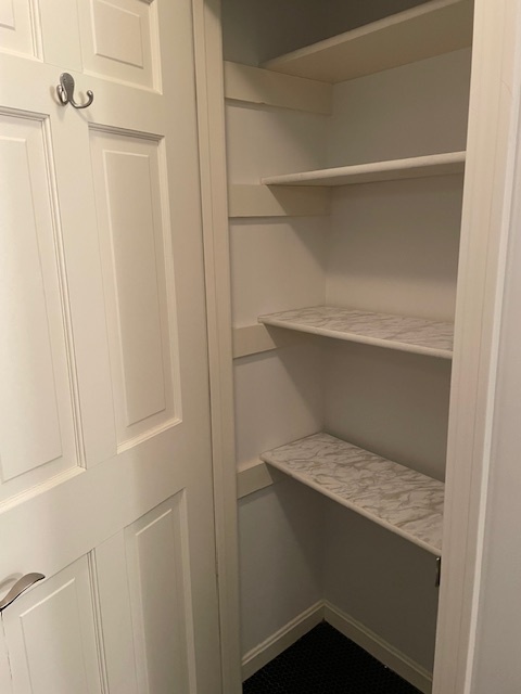 Bathroom linen closet - 9 Essex Dr