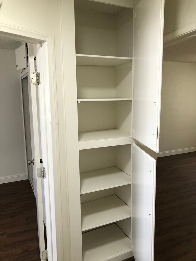Storage cabinets upstairs - 6110 Seville Ave