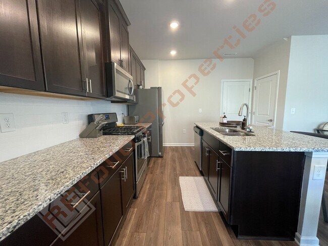Building Photo - Wonderful 3 Bedroom 2-Car Garage House wit...