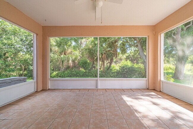 Building Photo - Spacious 3/2 with tranquil setting is waiting for you!