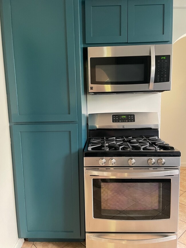 Kitchen w Stainless Steel Appliances - 835 S Holt Ave