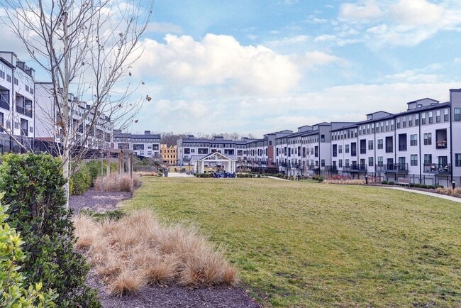 Building Photo - Three Story Brick End Unit with Rooftop Terrace