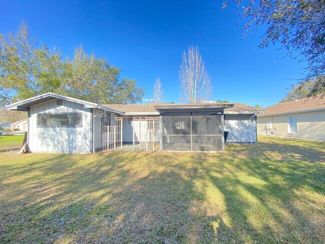 Building Photo - 2/2 home with garage - tile on inside with...