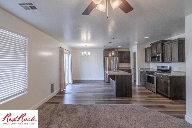 Building Photo - Move In Special - $500 Off First Months Rent! Stunning 4 Bedroom Townhome!