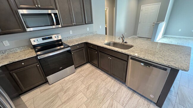 Building Photo - Beautiful 3 Bedroom Palm Bay Home with Upgrades & No Water Bill!