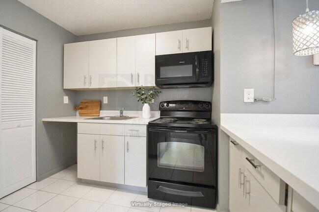 Building Photo - Prime Rental: Spacious 2-Bed, 2-Bath In Carmel Lakes Gated Community