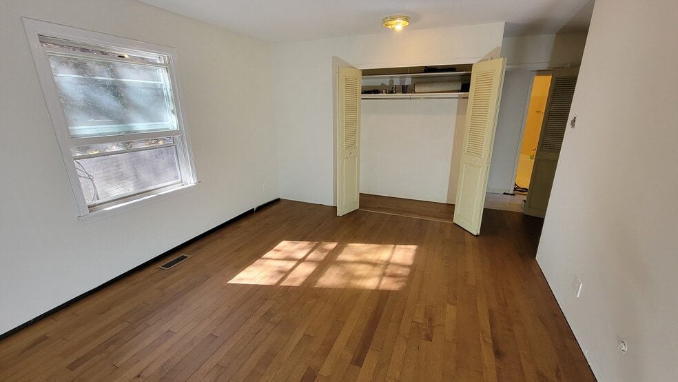 large bedroom, new maple floor - 3705 Winchell Ave