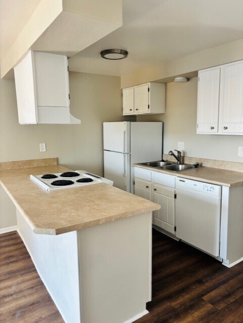 Step into a cozy kitchen designed for modern living and convenience. - Elati