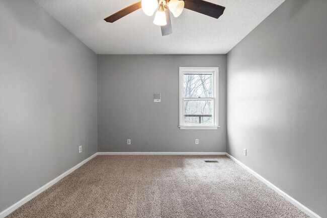 Building Photo - Lovely home on beautiful wooded corner lot