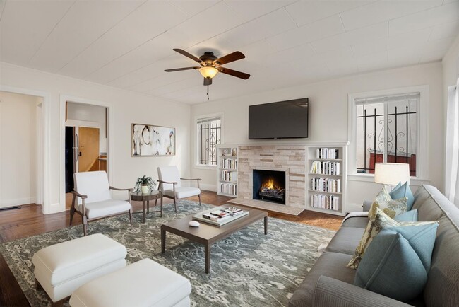 Spacious living room with lot of light. - 2108 E 23rd St