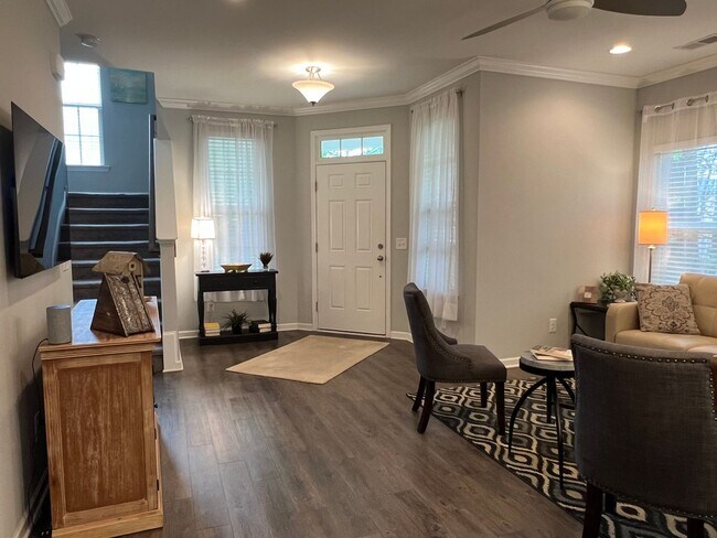 Building Photo - FURNISHED Three Bedroom Wellstone Model Home