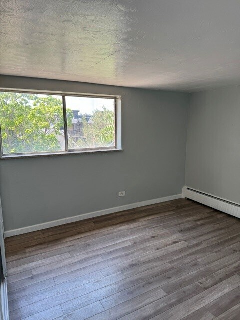 Building Photo - 701 E Bayaud Ave