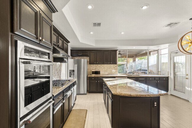 Building Photo - Welcome Home to Fall in Love with This Stu...