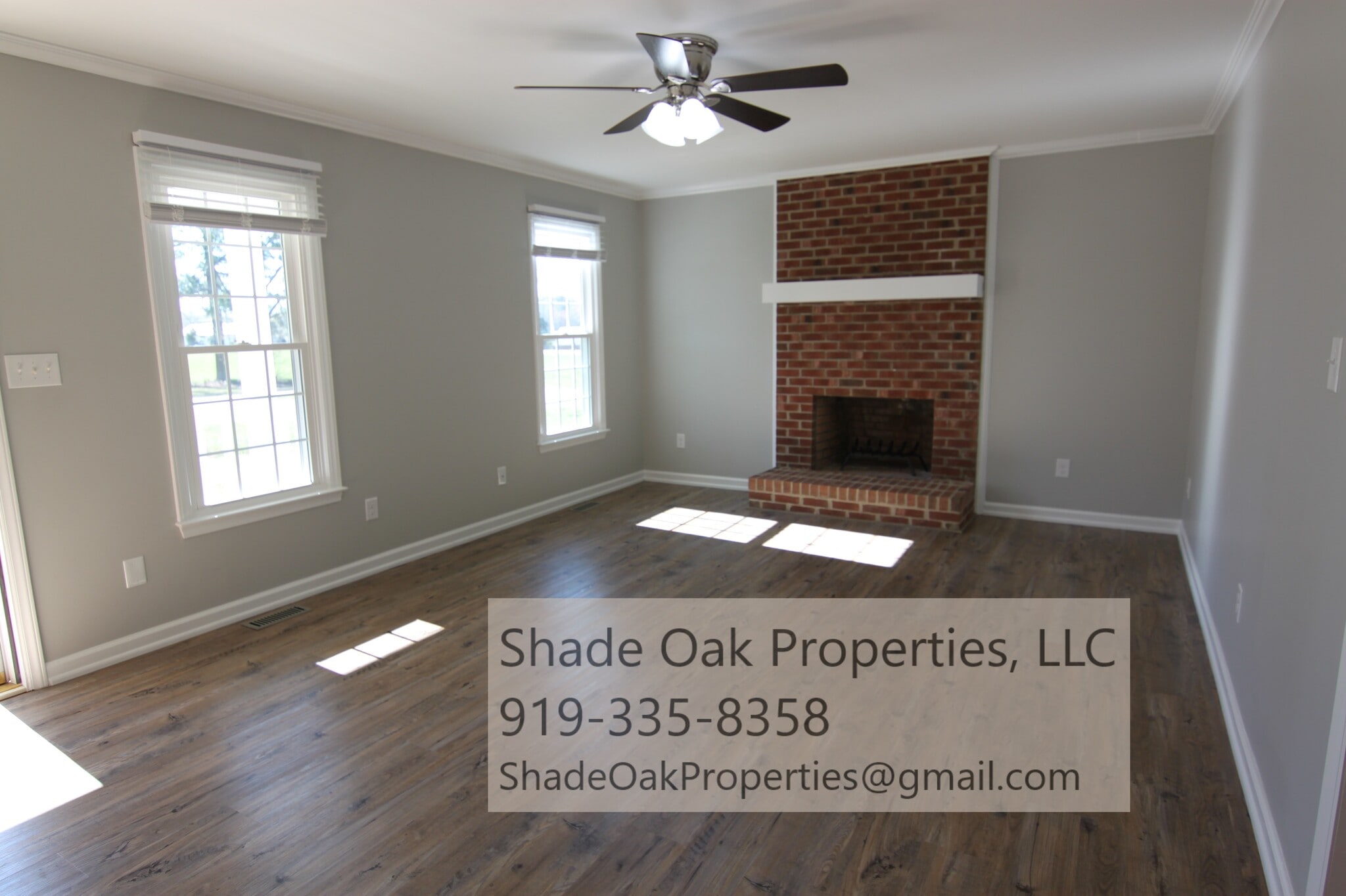Living room with fireplace - 8608 Manns Loop Rd