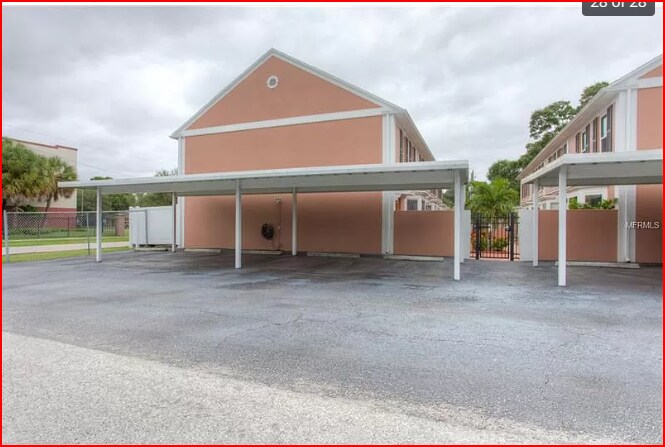Carport in rear of bldg. plenty of on street parking as well - 303 S Bungalow Park Ave