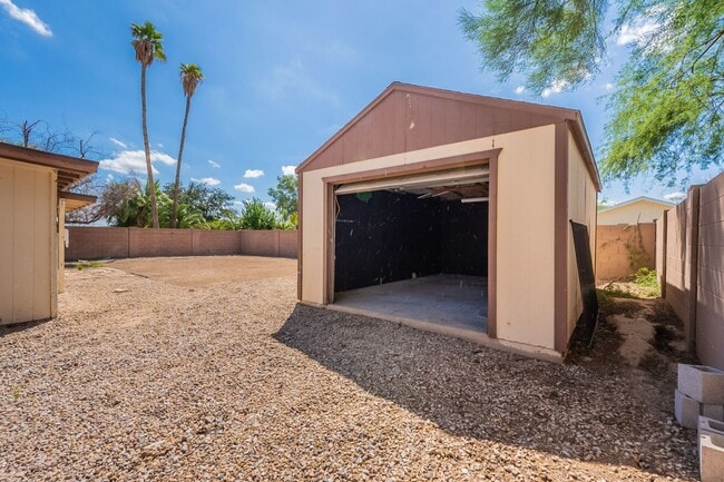 Building Photo - Three bedrooms plus big garage!