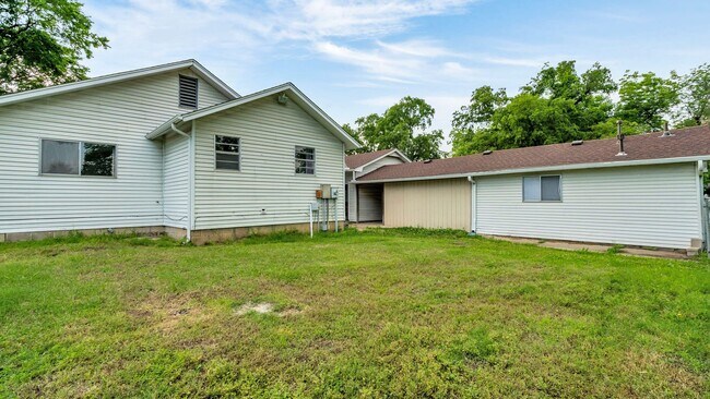 Building Photo - 1307 S 77th E Ave