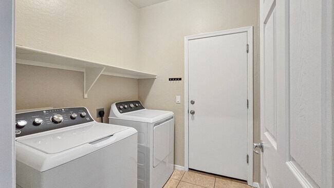 Building Photo - Gorgeous Home with Master Bedroom Downstairs!