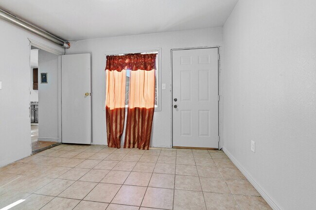 Building Photo - $1,930.95 - 3 Bedrooms, 1 Bathroom, Single Family Home in Aurora with fenced Yard!