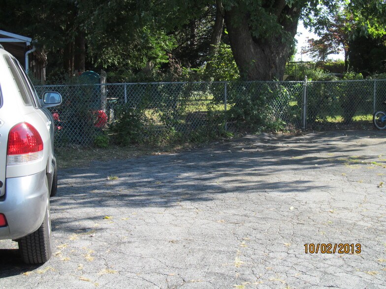 One assigned driveway parking space - 618 Biggs Ave