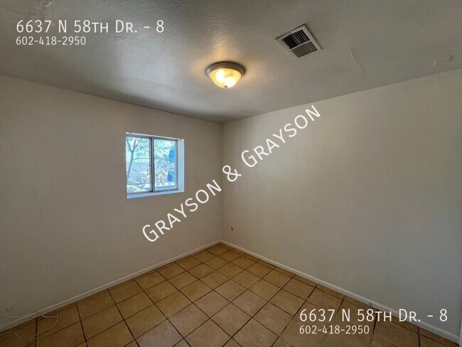 Building Photo - 6637 N 58th Dr