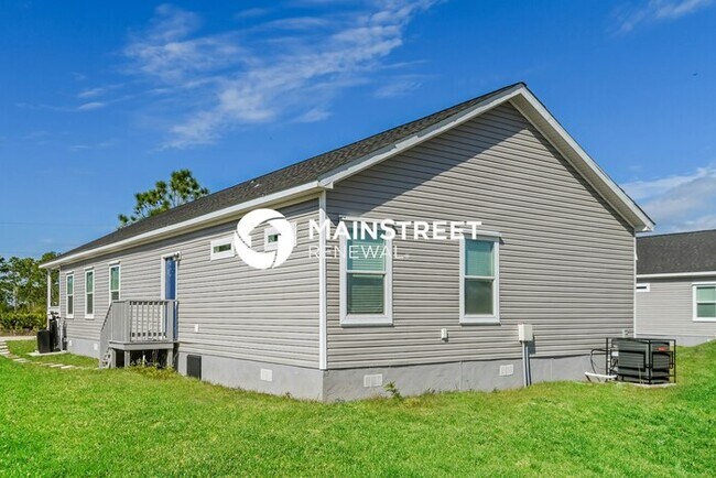Building Photo - 4 Bedroom Pet-Friendly Home in Lehigh Acres, FL with Main Street Renewal