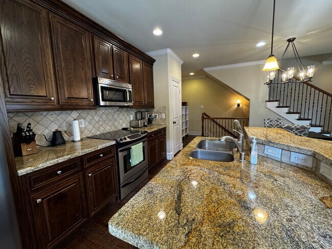 Building Photo - Sophisticated 2/2.5/2 Condo In Gated Commu...