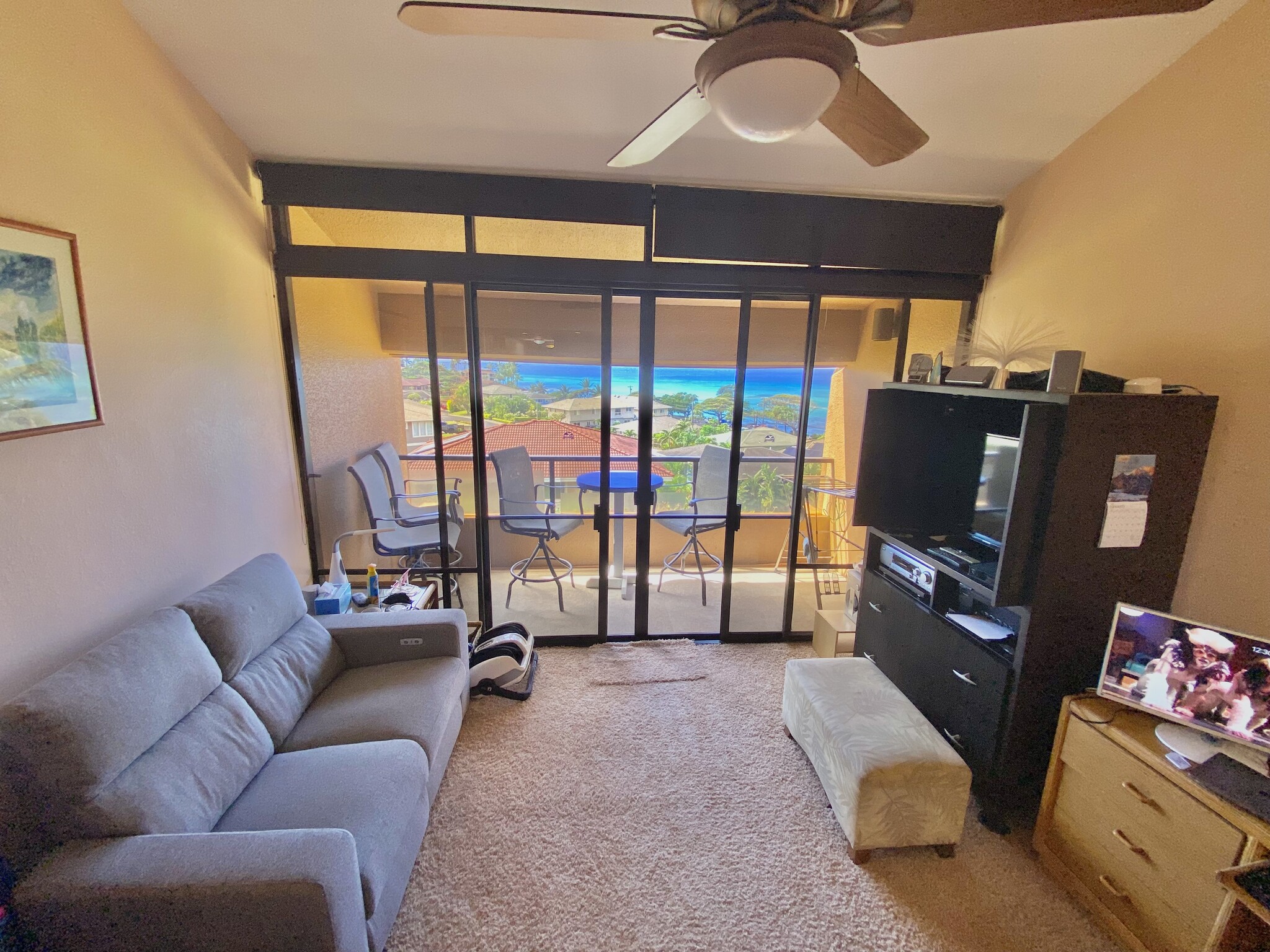 Living room (now with brand new laminate flooring - 4242 Lower Honoapiilani Rd