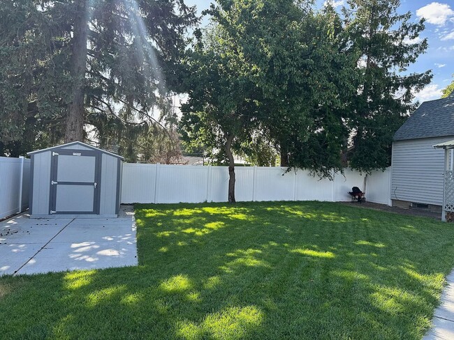 Building Photo - Ideally Located and Updated 4 Bed 2 Bath Fully-Fenced Home w/ Detached Garage/Shop!