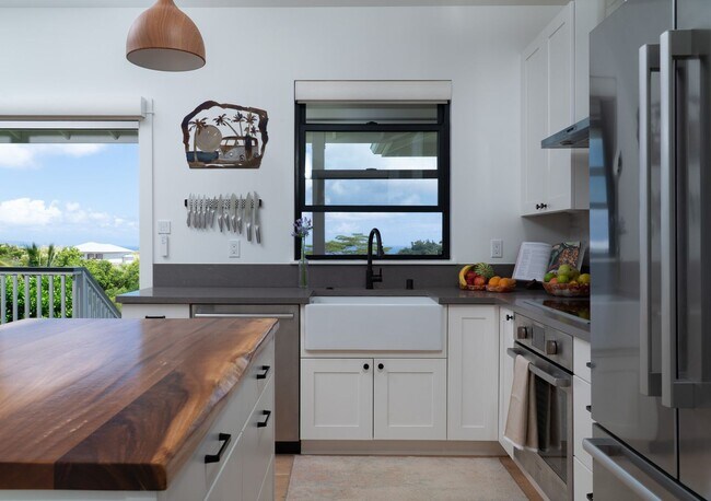 Building Photo - Elevated Haiku Retreat with Ocean Views, Designer Finishes & a Lush Edible Garden Sanctuary