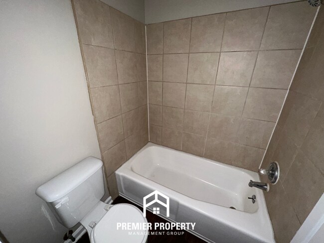 Building Photo - Beautiful 3BR/2BA Near Southwind | Soaring Vaulted Ceilings, Fireplace & Fenced Yard