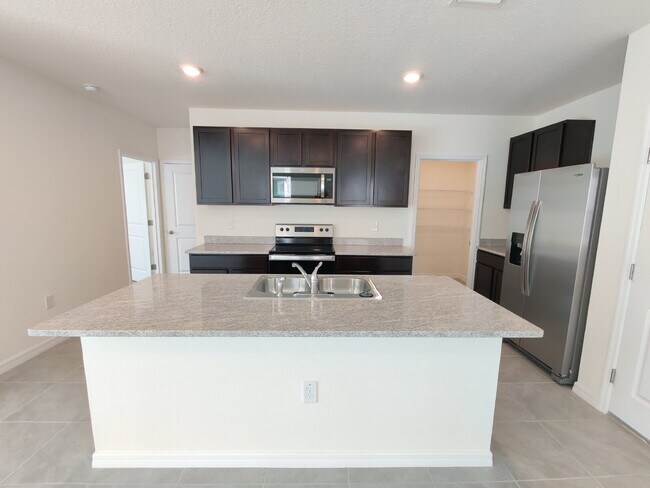 Building Photo - 34228 Jasper Stone Dr