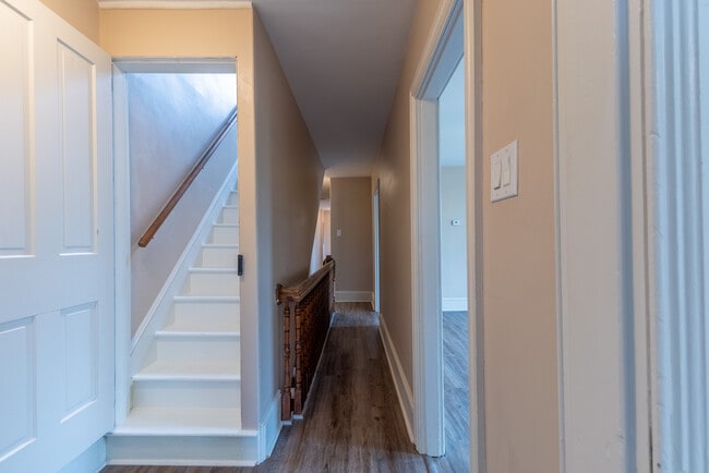 Hallway from bedroom 1 to upstairs rooms - 506 Washington St