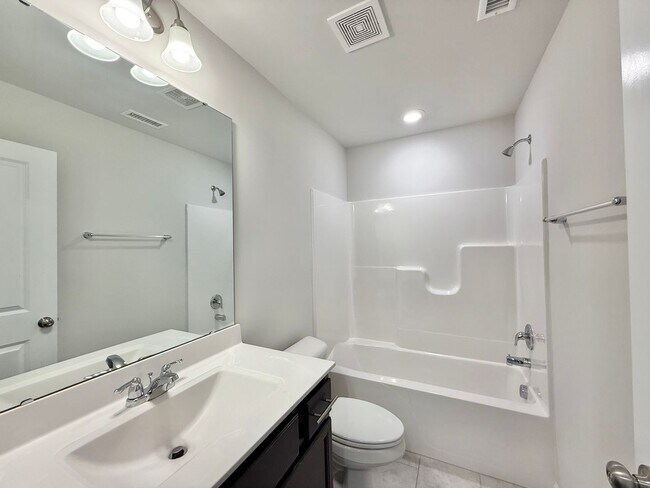 Building Photo - **OFFERING WAIVED APPLICATION FEES & $200 MOVE IN PROMOTION** Stunning 3BD, 2.5BA Raleigh Townhom...